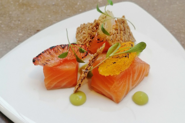 food displayed elegantly on a white plate