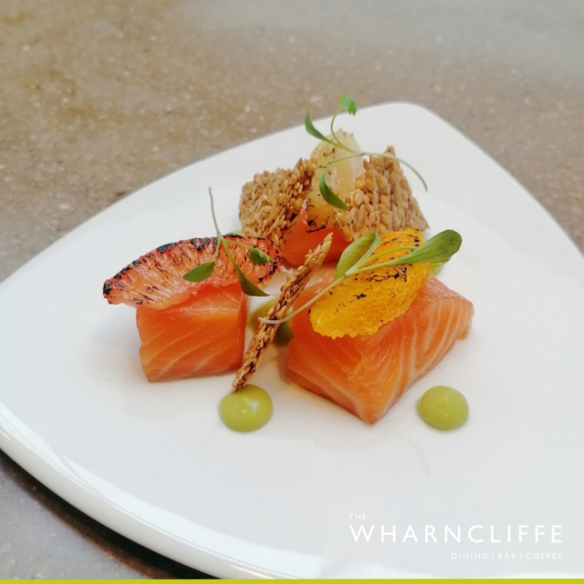 food displayed elegantly on a white plate