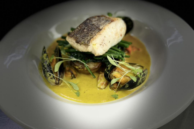 food displayed elegantly on a white plate