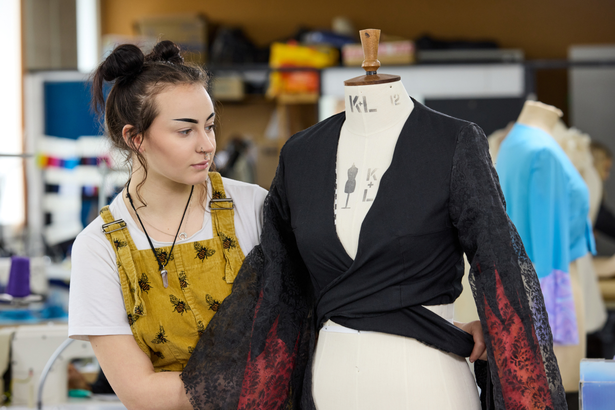 fashion student working on garment