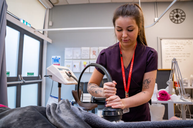 student using equipment