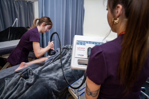 student using beauty equipment