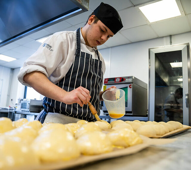 A student working in the kitchen at The Wharncliffe