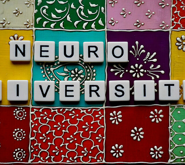Letters spelling our neurodiversity on a colourful patchwork background