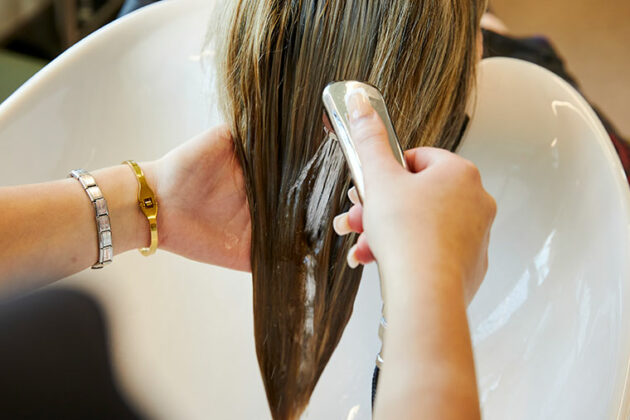 Someone having their hair washed