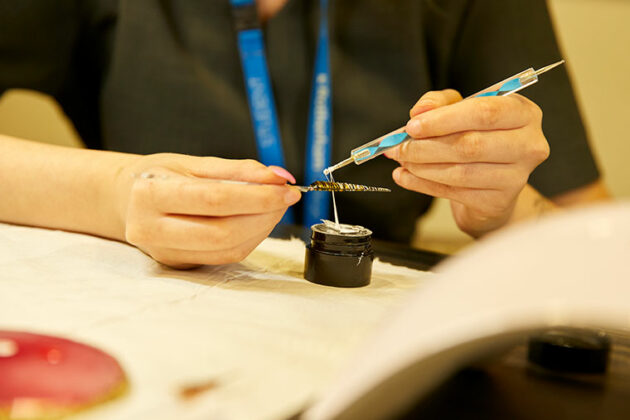 A close up of nail art